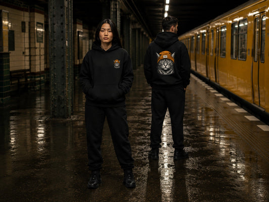 Beanie Cat Hoodie Ember worn on a subway platform