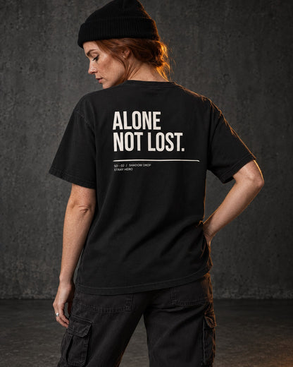 Alone Not Lost Tee Typography, worn, back print, black — AI-generated visual