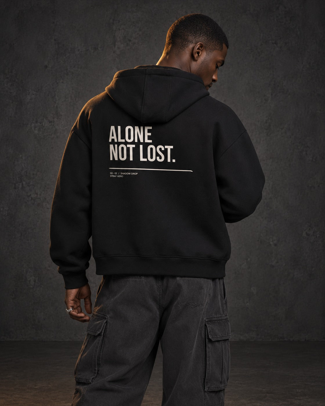 Alone Not Lost Zip Hoodie, worn, back print, black — AI-generated visual