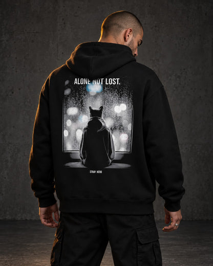 Alone Not Lost Hoodie, worn, back print, black — AI-generated visual