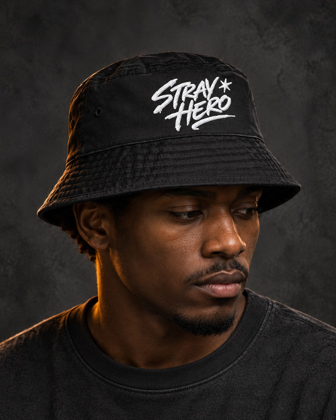 Signature Bucket Hat, worn, front embroidery, black — AI-generated visual