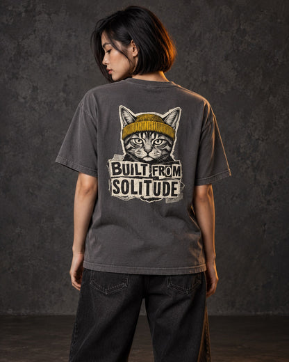 Built From Solitude Graffiti Tee, worn, back print, graphite — AI-generated visual