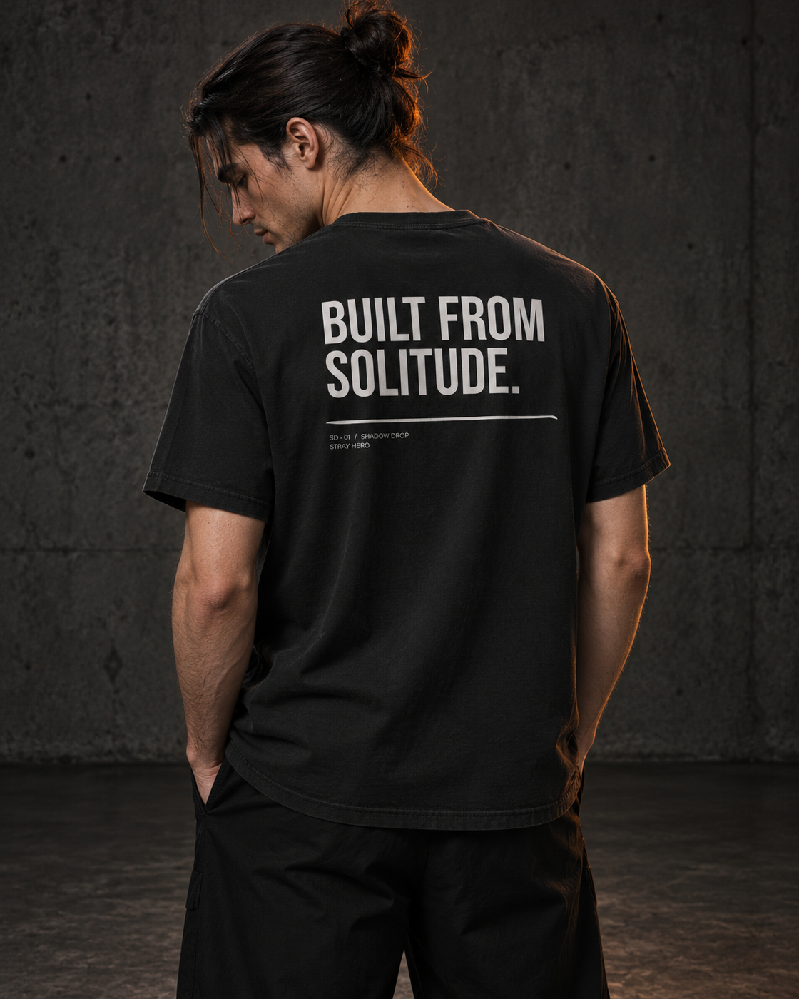 Built From Solitude Tee Typography, worn, back print, black — AI-generated visual