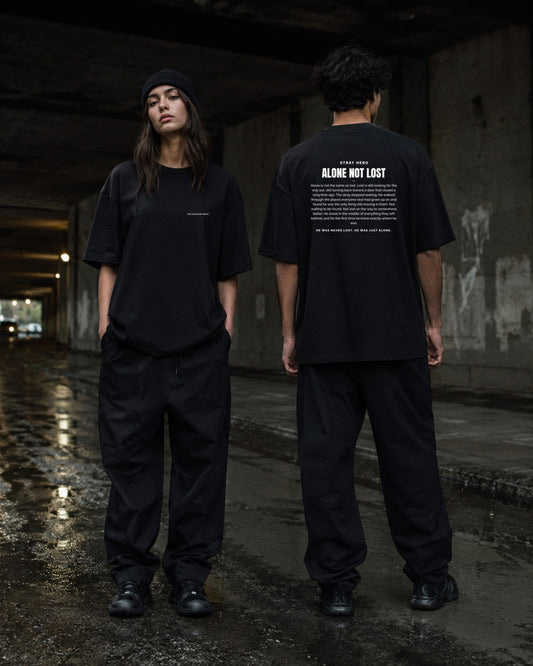 Alone Not Lost Story Tee Black — Lifestyle — AI-generated visual