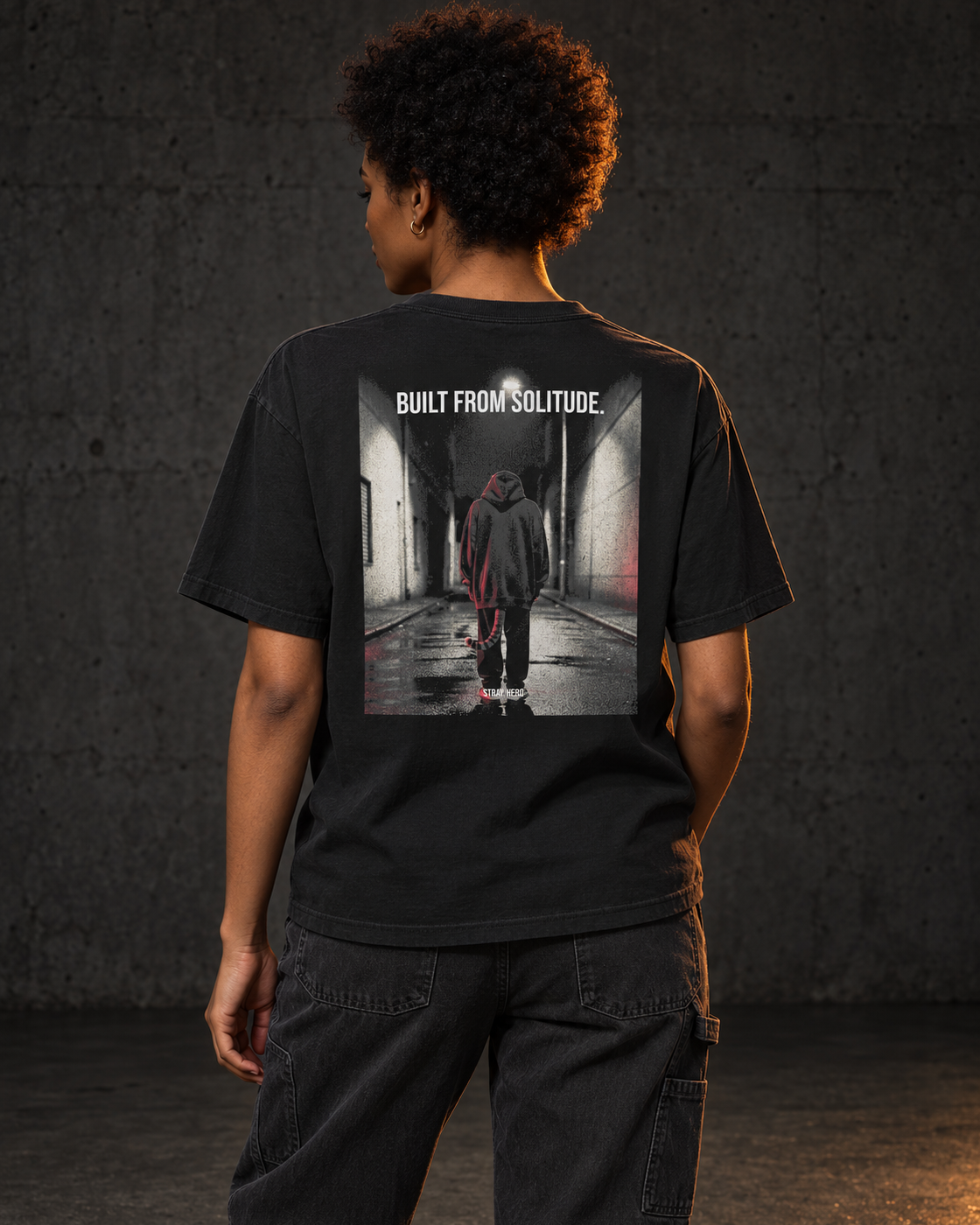 Built From Solitude Tee Cinematic, worn, back print, black — AI-generated visual