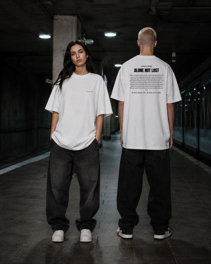 Alone Not Lost Story Tee White — Lifestyle — AI-generated visual
