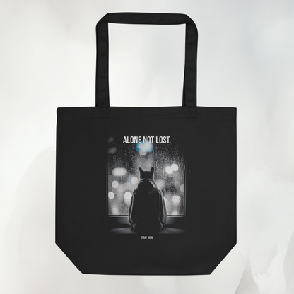 Schwarze Bio-Baumwoll-Tote mit cinematischem Alone-Not-Lost-Motiv