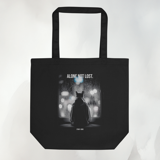 Schwarze Bio-Baumwoll-Tote mit cinematischem Alone-Not-Lost-Motiv