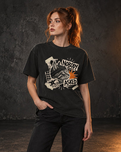Nobody Asked Tee, worn, front print, black — AI-generated visual