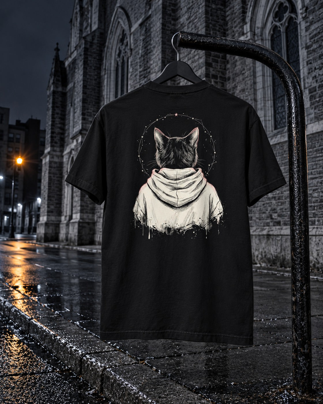 Rosary Tee, back print, black, hanging on a bike rack on a city street at night — AI-generated visual
