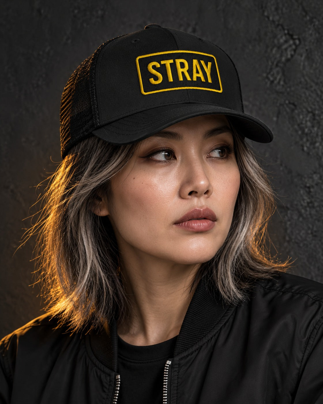 Tag Trucker Cap, worn, front patch, black — AI-generated visual