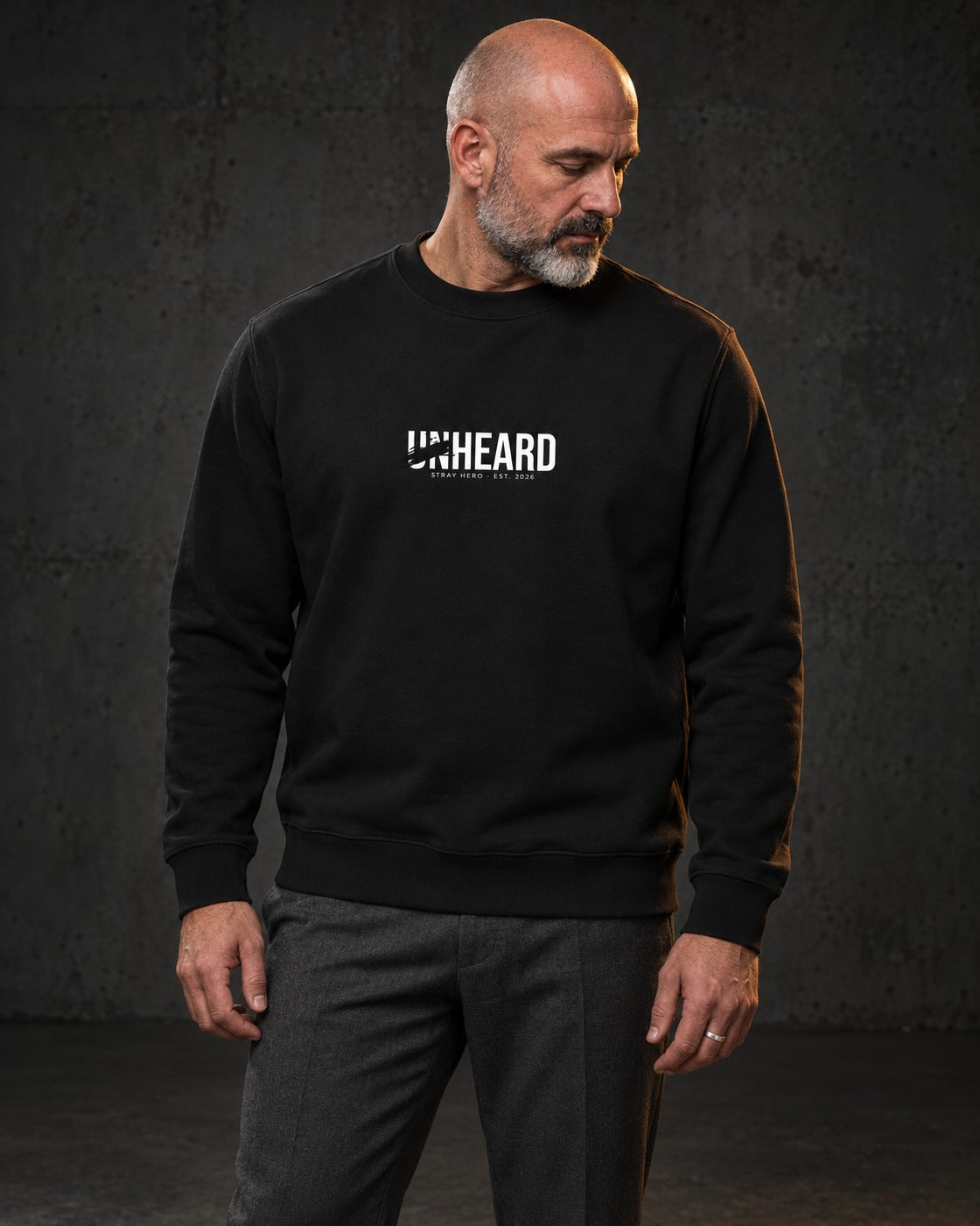 Unheard Sweatshirt, worn, front print, black — AI-generated visual