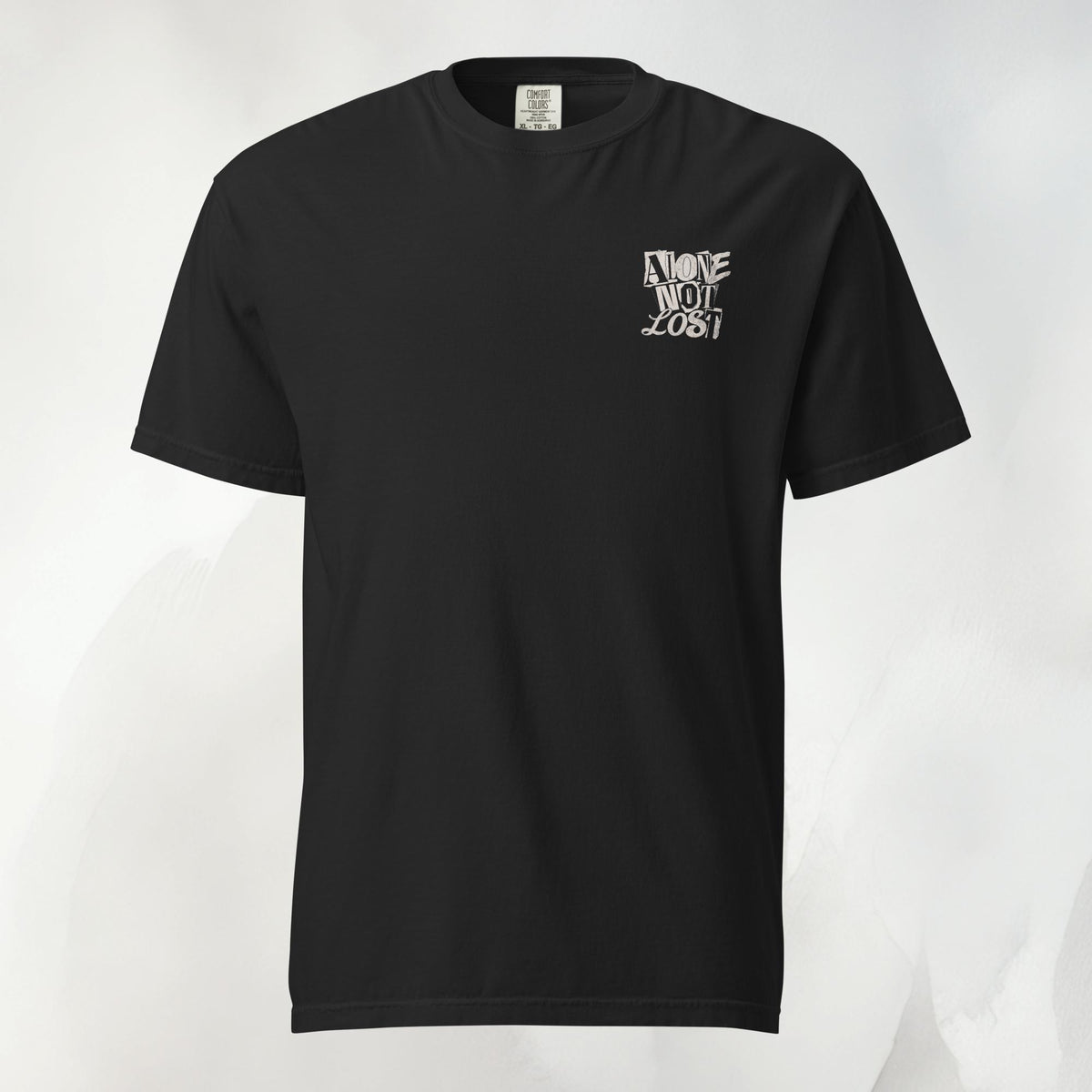 Front of the Alone Not Lost graffiti tee in black, garment-dyed heavyweight cotton, no front graphic
