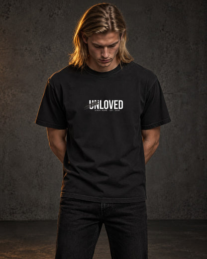 Unloved Tee, worn, front print, black — AI-generated visual